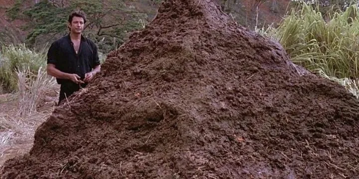 Ian Malcolm with a pile of dinosaur crap.