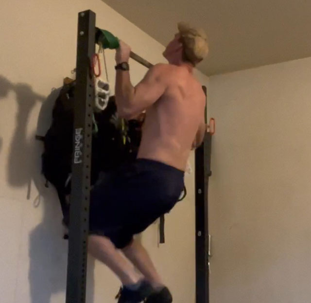 The start position of the negative pull-up.