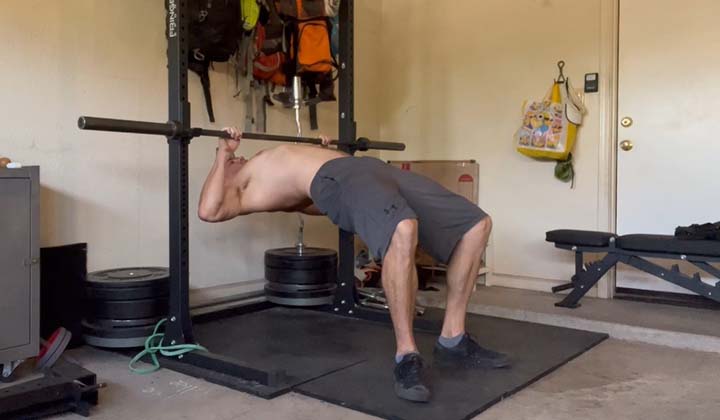 The author of Lunch Break Fitness in the top position of a modified inverted row.